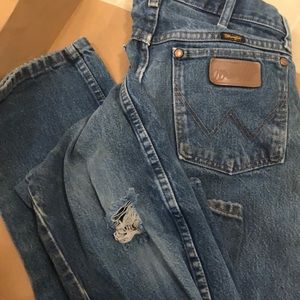 Worn out vintage blue wrangler